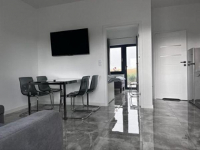 Zwei-Zimmer-Reihenhauswohnung, Gąski